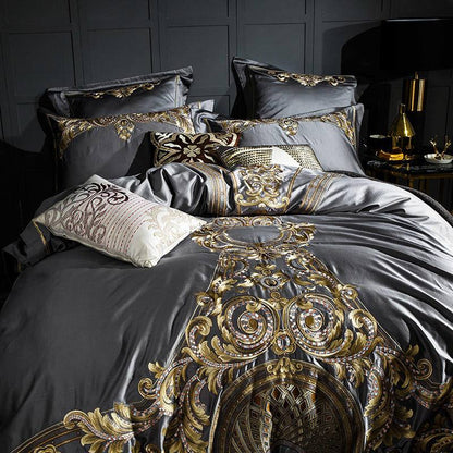 Luxurious Egyptian Cotton Sheets showcasing intricate gold embroidered patterns.