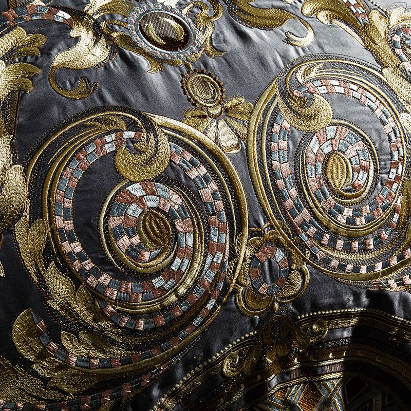 Detailed view of lavish embroidery on Egyptian Cotton Sheets in metallic thread.