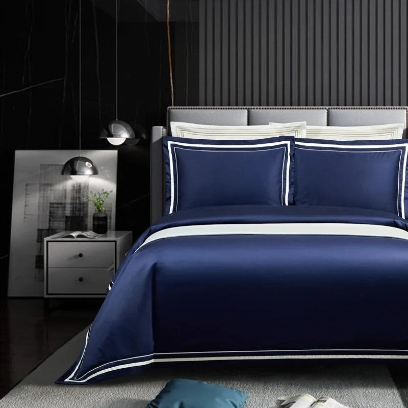 Embroidered luxury sheets placed on a bed