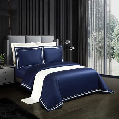 Luxury cotton sheets laid out on a bed in a beautifully designed bedroom